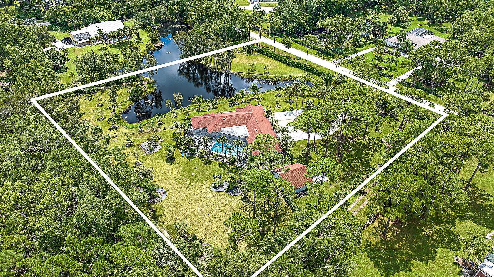 2.492 Acres of Residential Land with Home for Sale in Jupiter, Florida