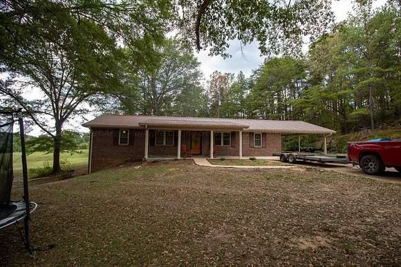 4 Acres of Residential Land with Home for Sale in Lynn, Alabama