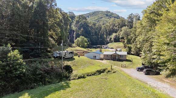 9.91 Acres of Residential Land with Home for Sale in Sylva, North Carolina