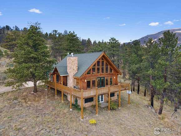 4.73 Acres of Residential Land with Home for Sale in Glen Haven, Colorado