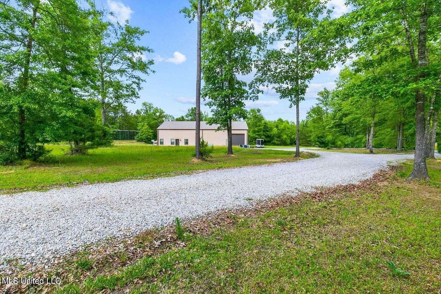 14.11 Acres of Land with Home for Sale in Florence, Mississippi