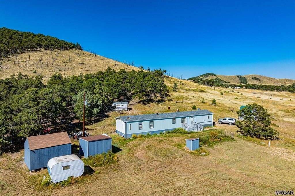 2.49 Acres of Residential Land with Home for Sale in Cotopaxi, Colorado