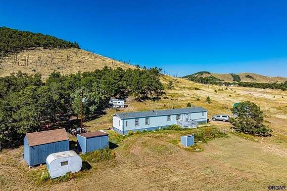 2.49 Acres of Residential Land with Home for Sale in Cotopaxi, Colorado