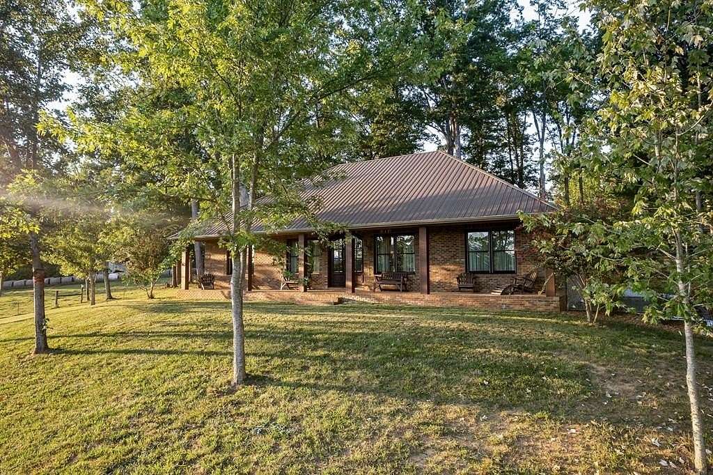 8.61 Acres of Land with Home for Sale in Hilham, Tennessee