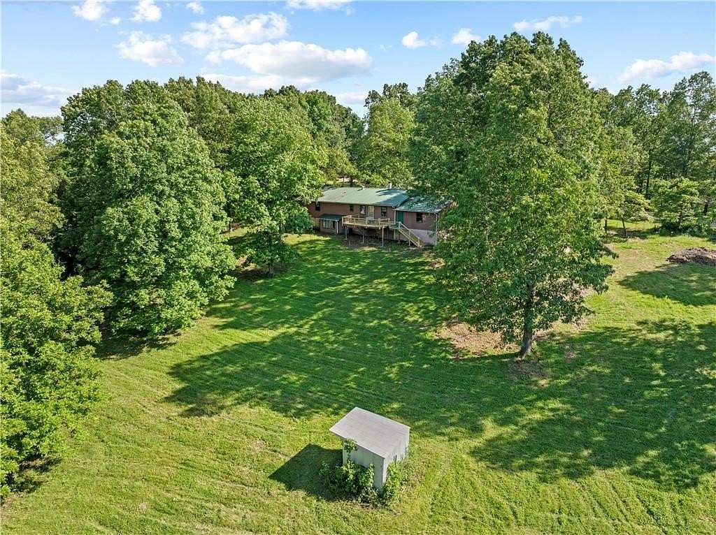 15.75 Acres of Land with Home for Sale in Harrison, Arkansas