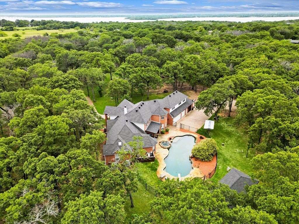 5.105 Acres of Land with Home for Sale in Oak Point, Texas