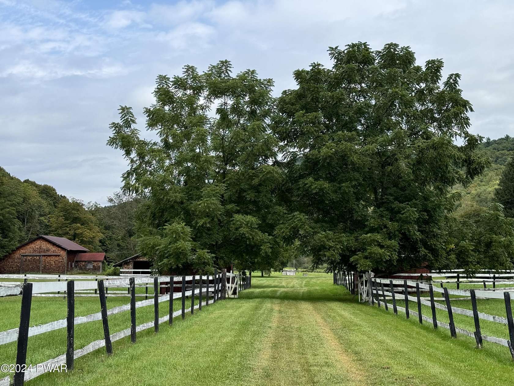 90.15 Acres of Agricultural Land with Home for Sale in Starlight, Pennsylvania