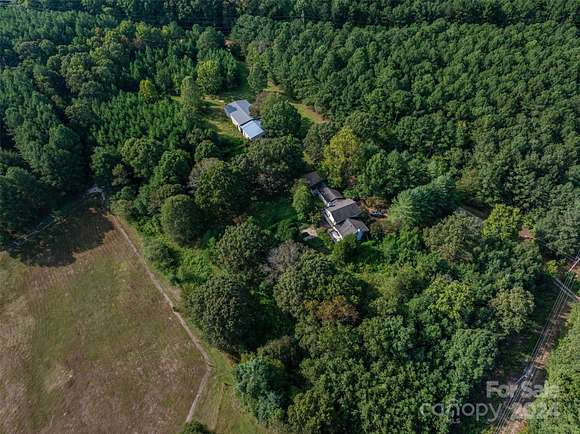 6.78 Acres of Residential Land with Home for Sale in Iron Station, North Carolina