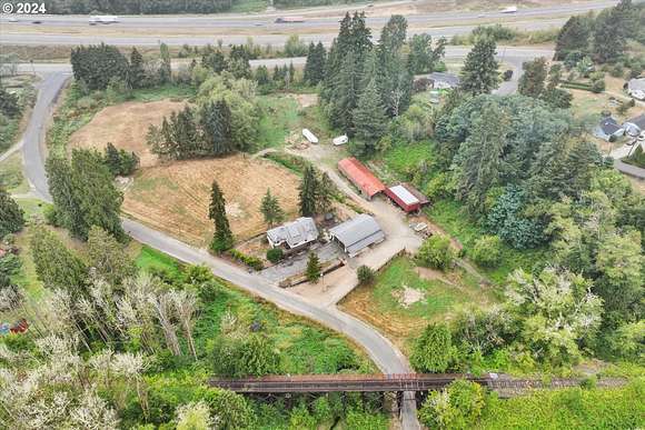 5.81 Acres of Land with Home for Sale in Kelso, Washington