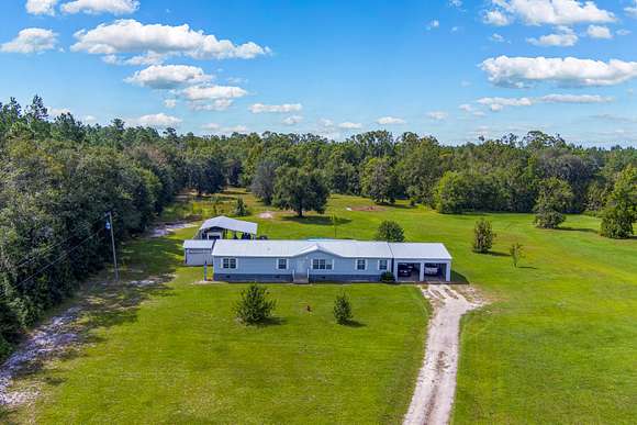 15.9 Acres of Recreational Land with Home for Sale in Jasper, Florida