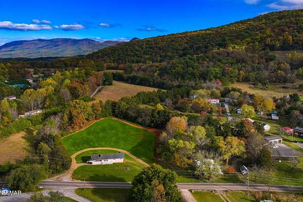 1.12 Acres of Residential Land with Home for Sale in Sevierville, Tennessee