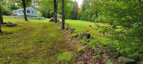 5.17 Acres of Residential Land with Home for Sale in Burlington, Maine