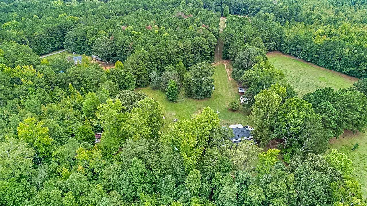 25.87 Acres of Land with Home for Sale in Forsyth, Georgia