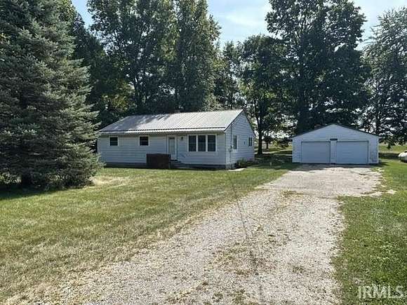 5.65 Acres of Residential Land with Home for Auction in Claypool, Indiana