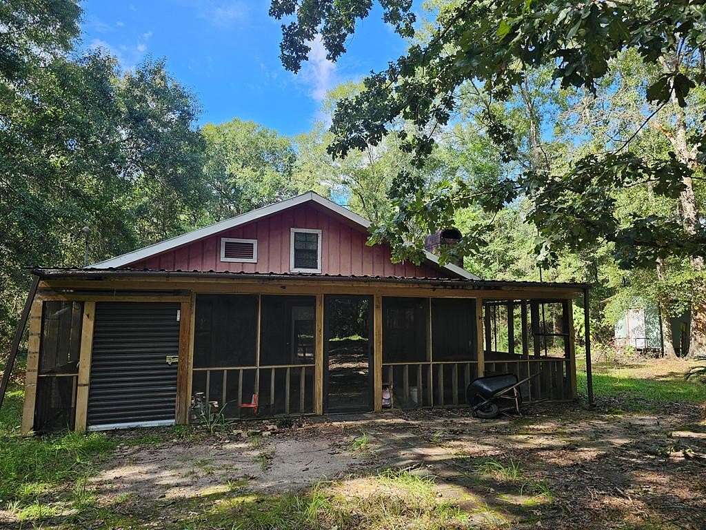 13.3 Acres of Land with Home for Sale in Picayune, Mississippi