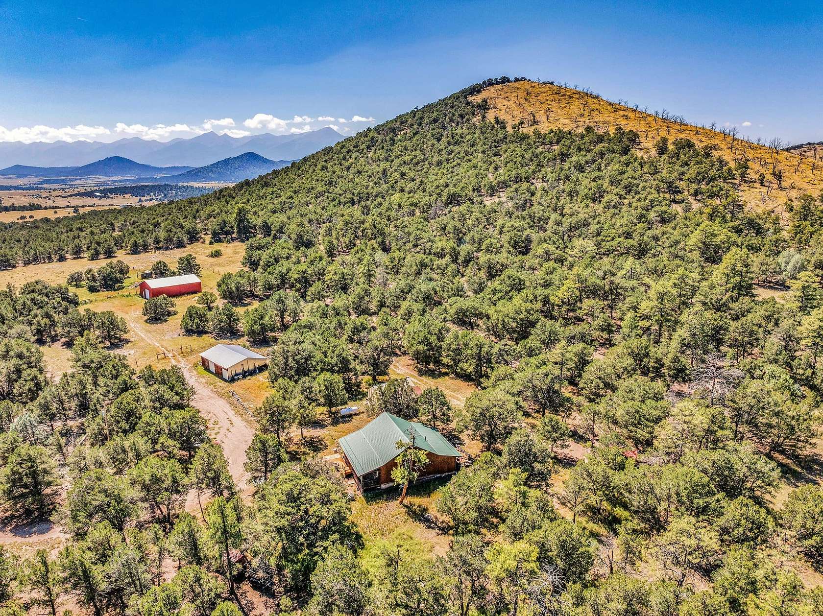 118.87 Acres of Recreational Land with Home for Sale in Cotopaxi, Colorado