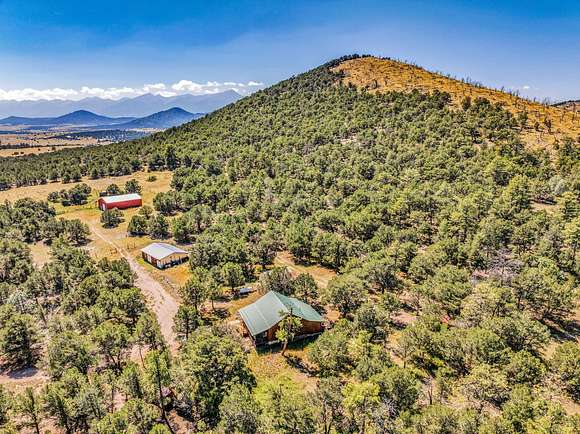 118.87 Acres of Recreational Land with Home for Sale in Cotopaxi, Colorado