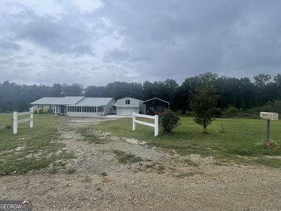 8.52 Acres of Land with Home for Sale in Carnesville, Georgia