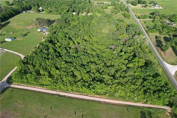 17.5 Acres of Land with Home for Sale in Gravette, Arkansas