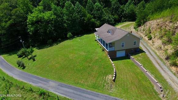 93.5 Acres of Recreational Land with Home for Sale in Vonore, Tennessee