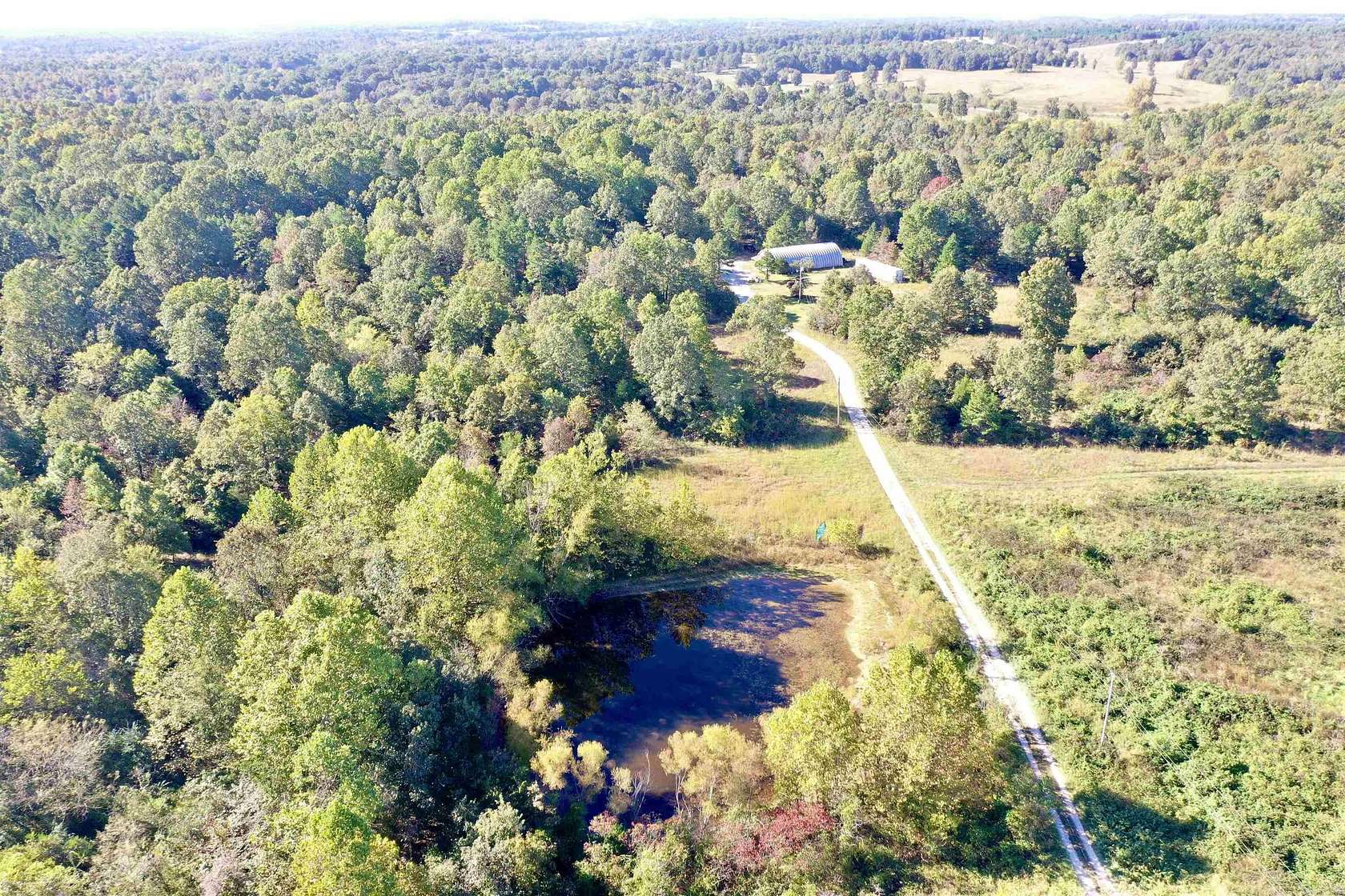 60.86 Acres of Land with Home for Sale in Sage, Arkansas