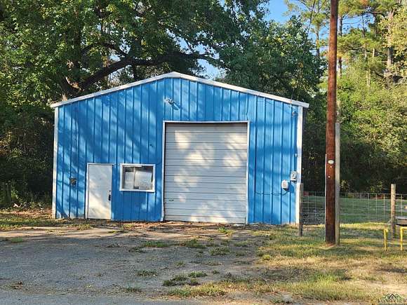 0.5 Acres of Commercial Land for Sale in Carthage, Texas