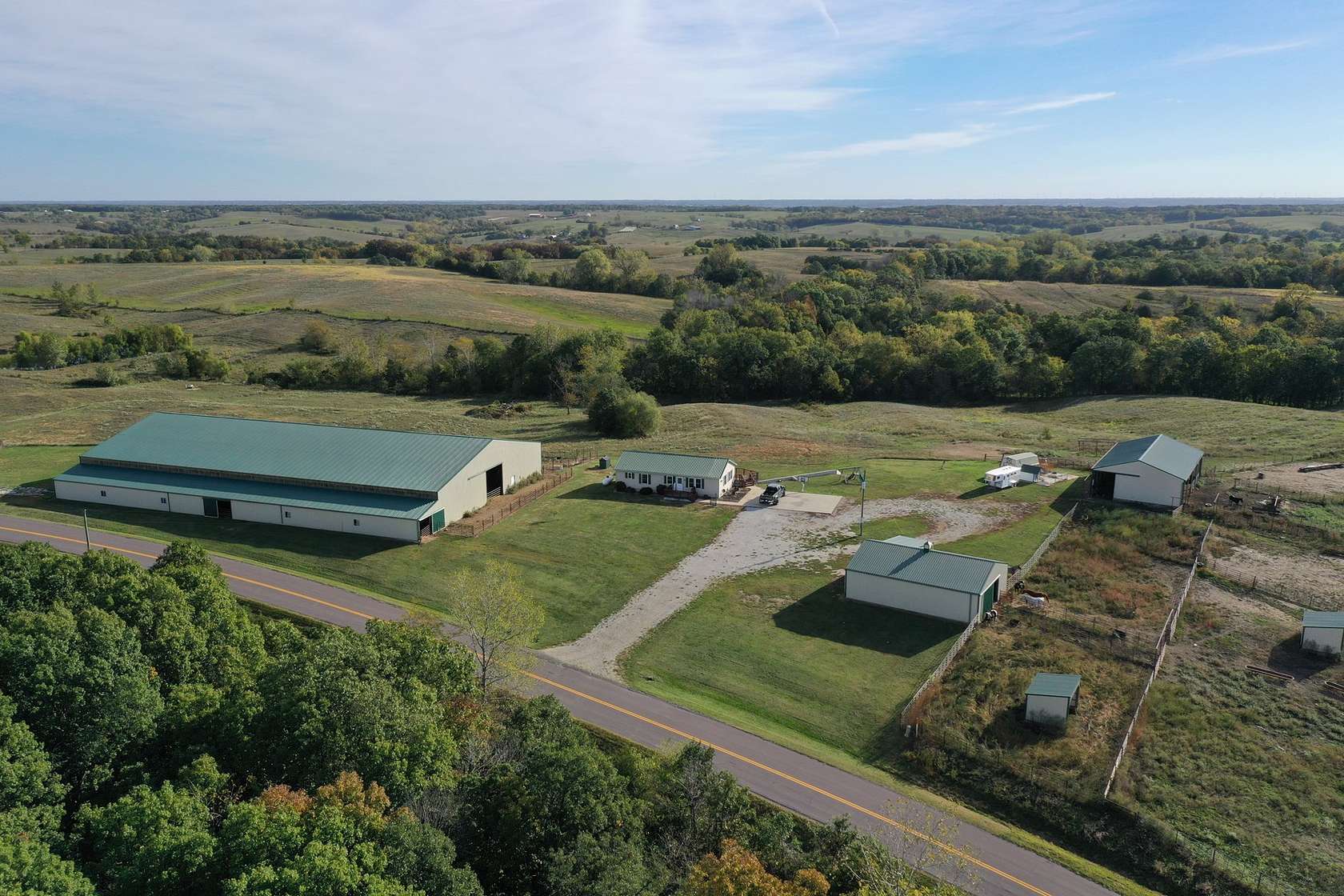 80 Acres of Agricultural Land with Home for Sale in Unionville, Missouri