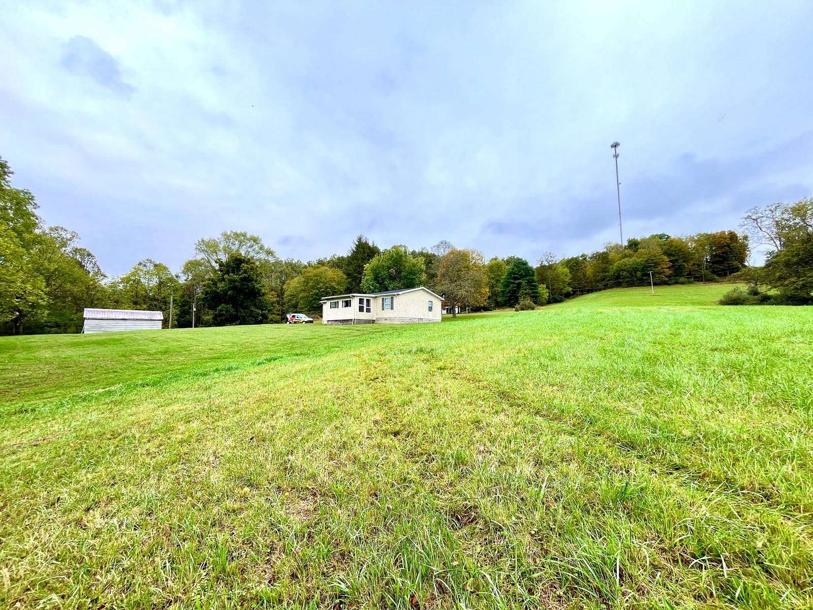 29.8 Acres of Land with Home for Auction in Middlebourne, West Virginia