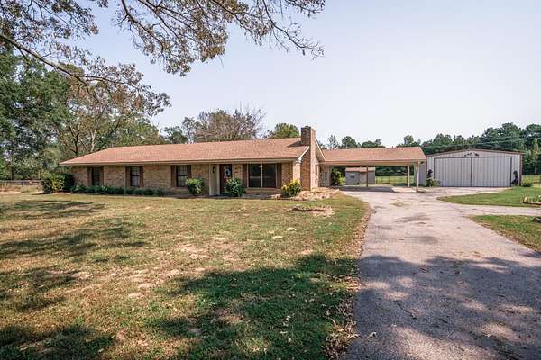 3.65 Acres of Land with Home for Sale in Daingerfield, Texas