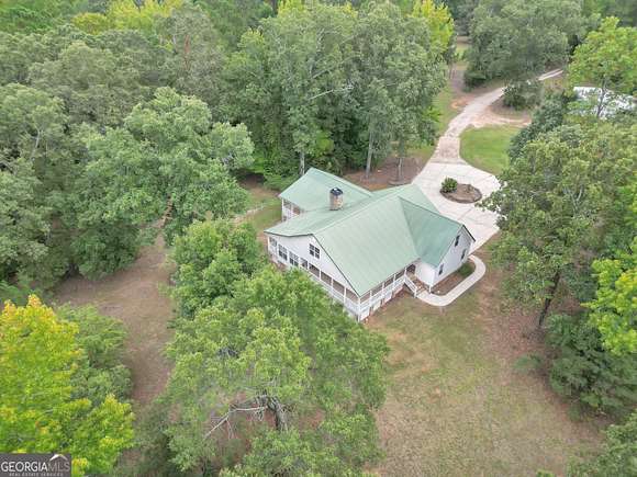 39 Acres of Agricultural Land with Home for Sale in Jackson, Georgia