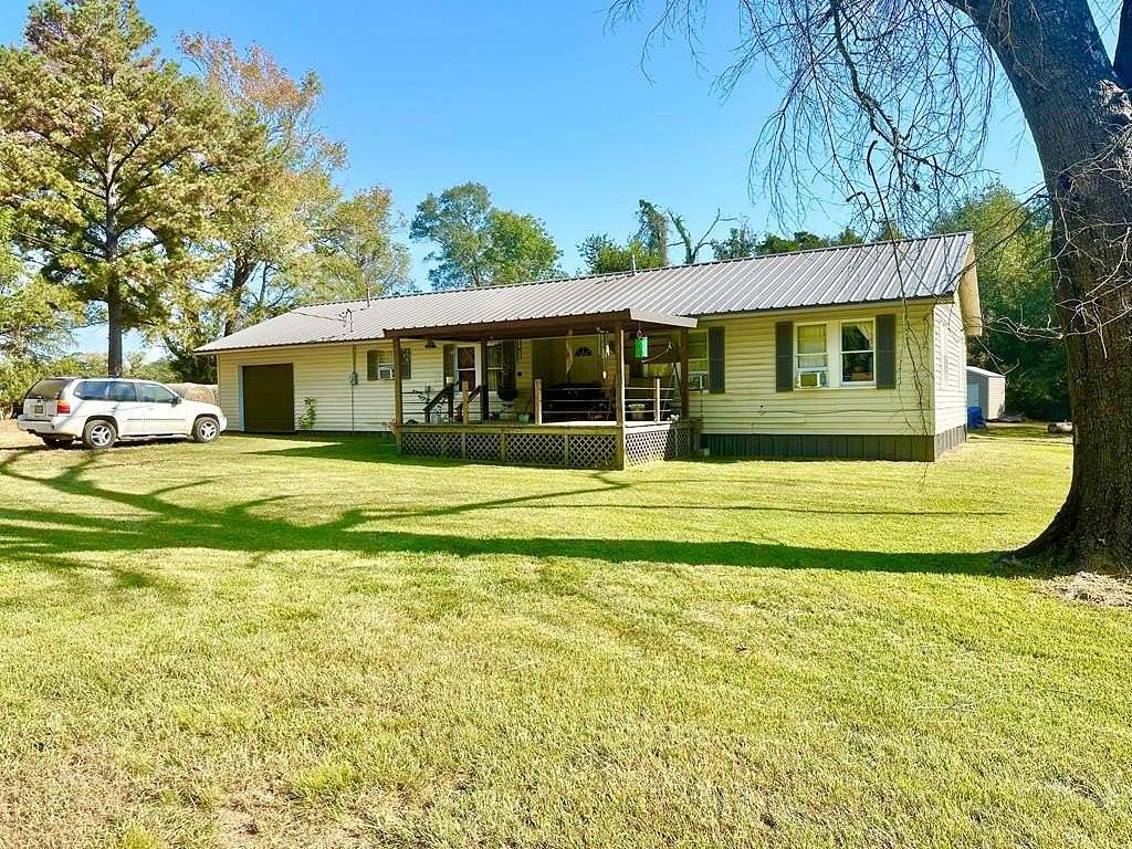 6 Acres of Residential Land with Home for Sale in Elkhart, Texas