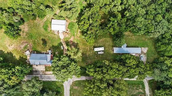 37.1 Acres of Recreational Land with Home for Sale in Cleveland, Missouri