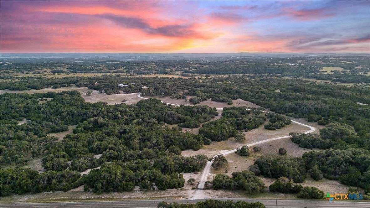 60.163 Acres of Agricultural Land with Home for Sale in Blanco, Texas