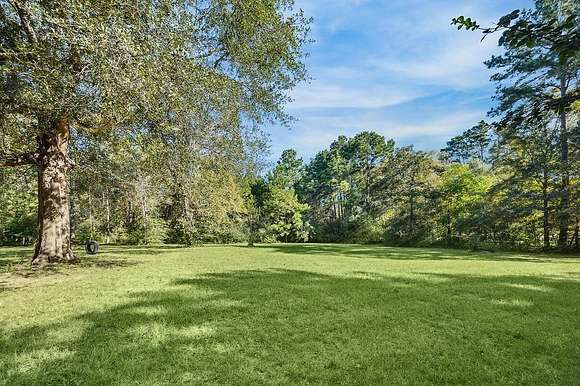 5 Acres of Land with Home for Sale in Magnolia, Texas