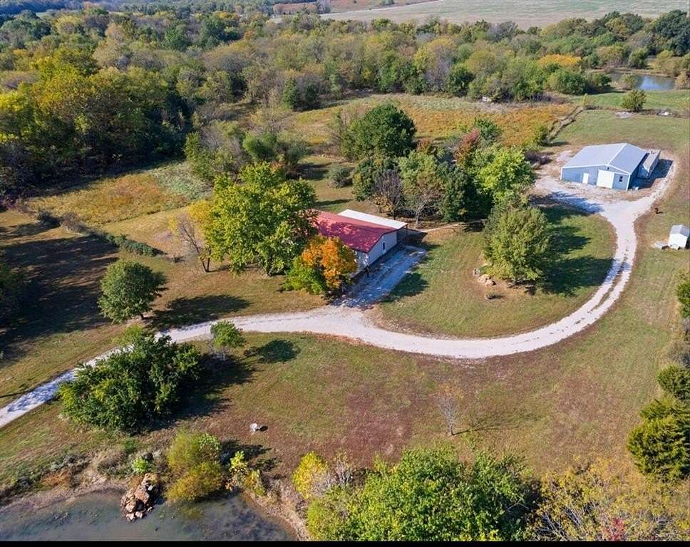 12.6 Acres of Land with Home for Sale in Garden City, Missouri