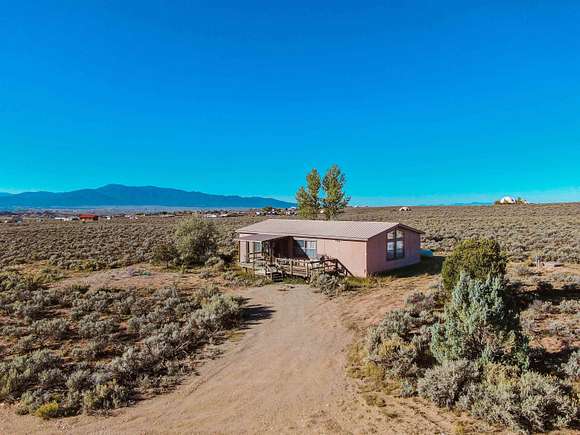 3 Acres of Residential Land with Home for Sale in El Prado, New Mexico