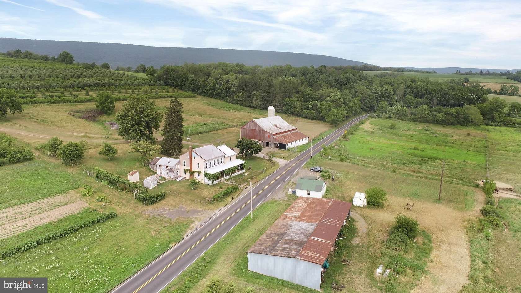 56.38 Acres of Agricultural Land with Home for Auction in McClure, Pennsylvania