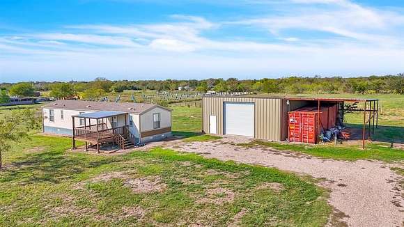 2.499 Acres of Residential Land with Home for Sale in Quinlan, Texas