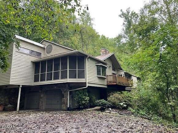 7.95 Acres of Residential Land with Home for Sale in Gatlinburg, Tennessee