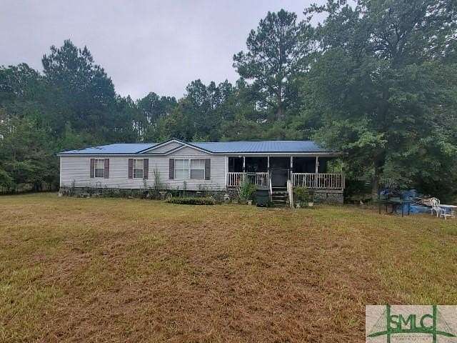 5.5 Acres of Residential Land with Home for Sale in Ludowici, Georgia