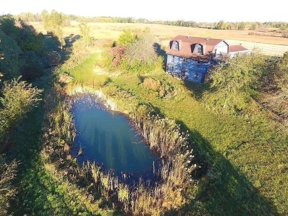 10.09 Acres of Land with Home for Sale in Osseo, Michigan