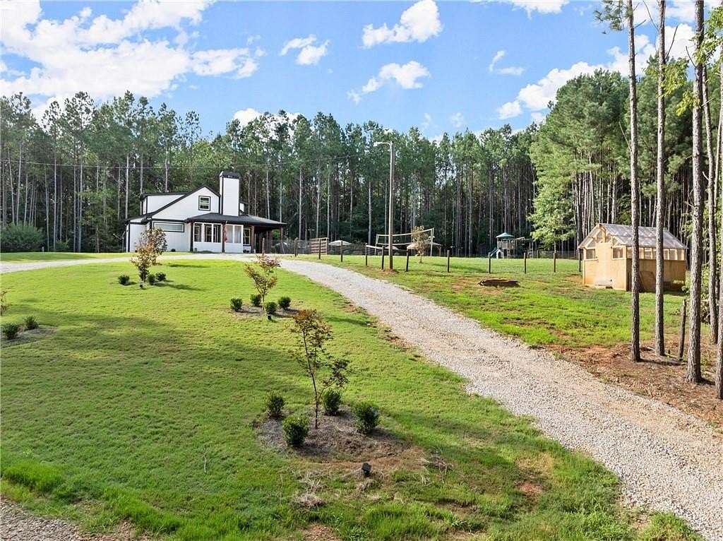 12.08 Acres of Land with Home for Sale in Gillsville, Georgia