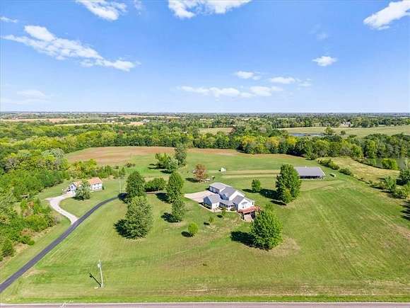 20.05 Acres of Land with Home for Auction in Lawson, Missouri