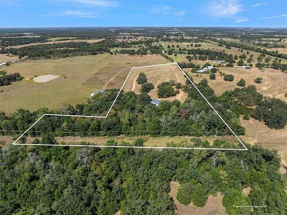 7.317 Acres of Land with Home for Sale in Cameron, Texas