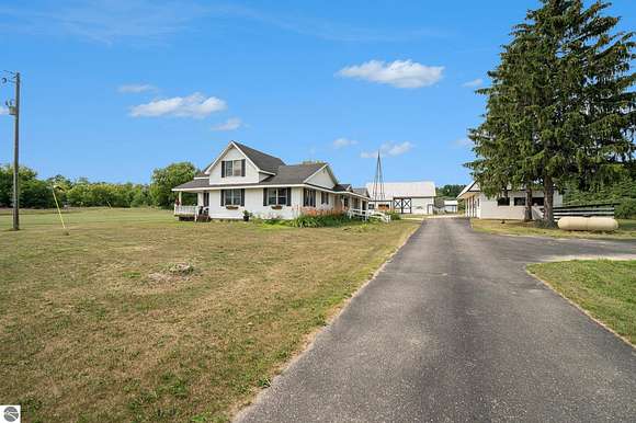 217 Acres of Land with Home for Sale in Cedar, Michigan