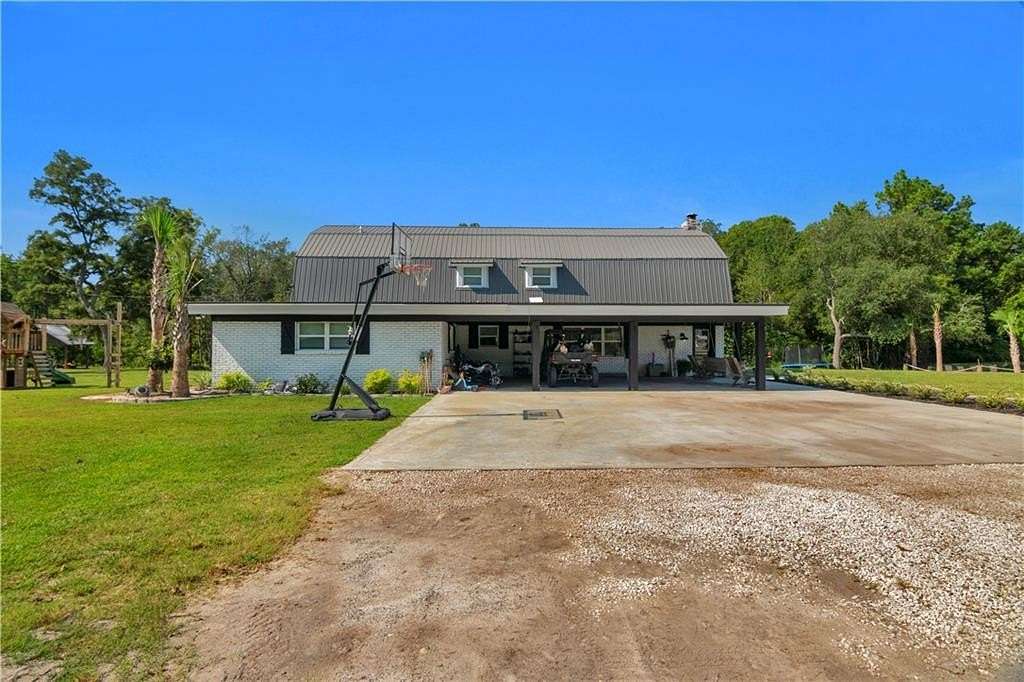 12.24 Acres of Recreational Land with Home for Sale in Jesup, Georgia