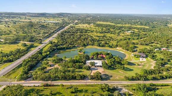 26.28 Acres of Recreational Land with Home for Sale in Blanco, Texas