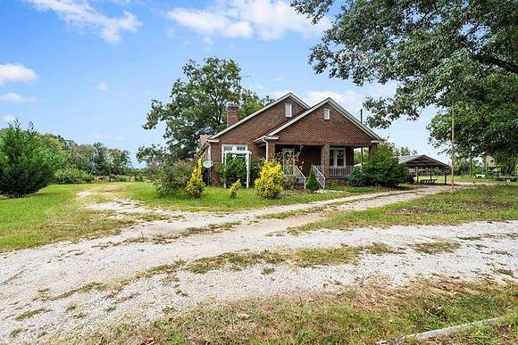 25.544 Acres of Agricultural Land with Home for Sale in Silverstreet, South Carolina