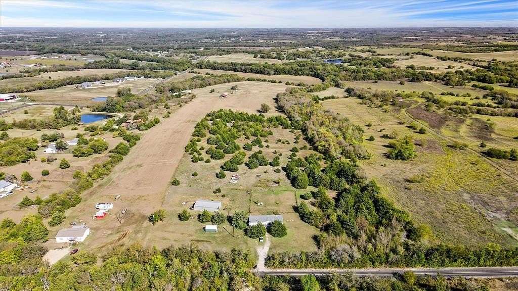 11.21 Acres of Land with Home for Sale in Farmersville, Texas