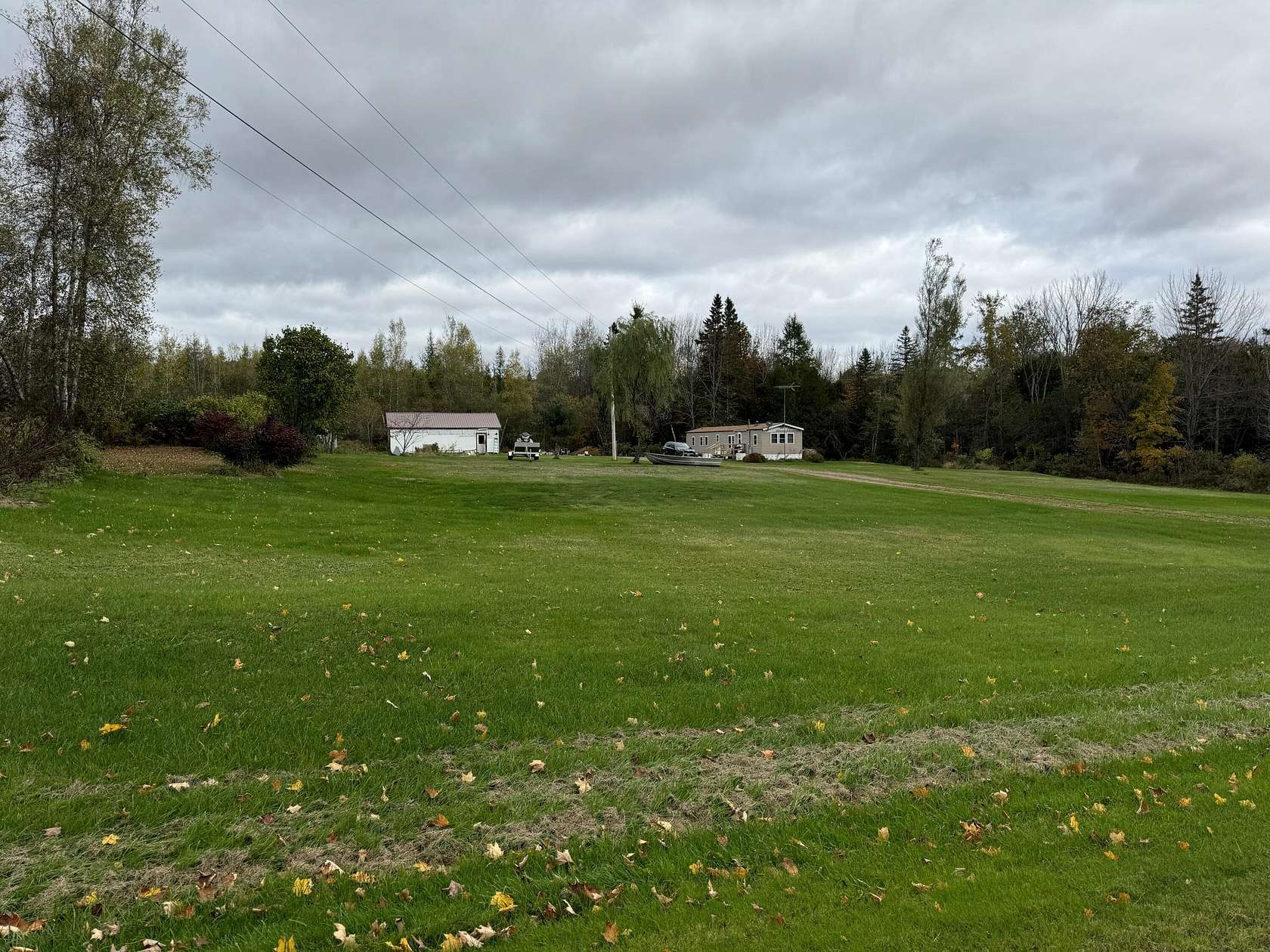 18 Acres of Land with Home for Sale in Dexter, Maine